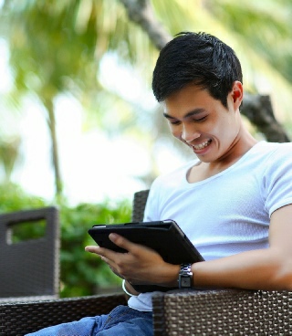 Man reading testimonials